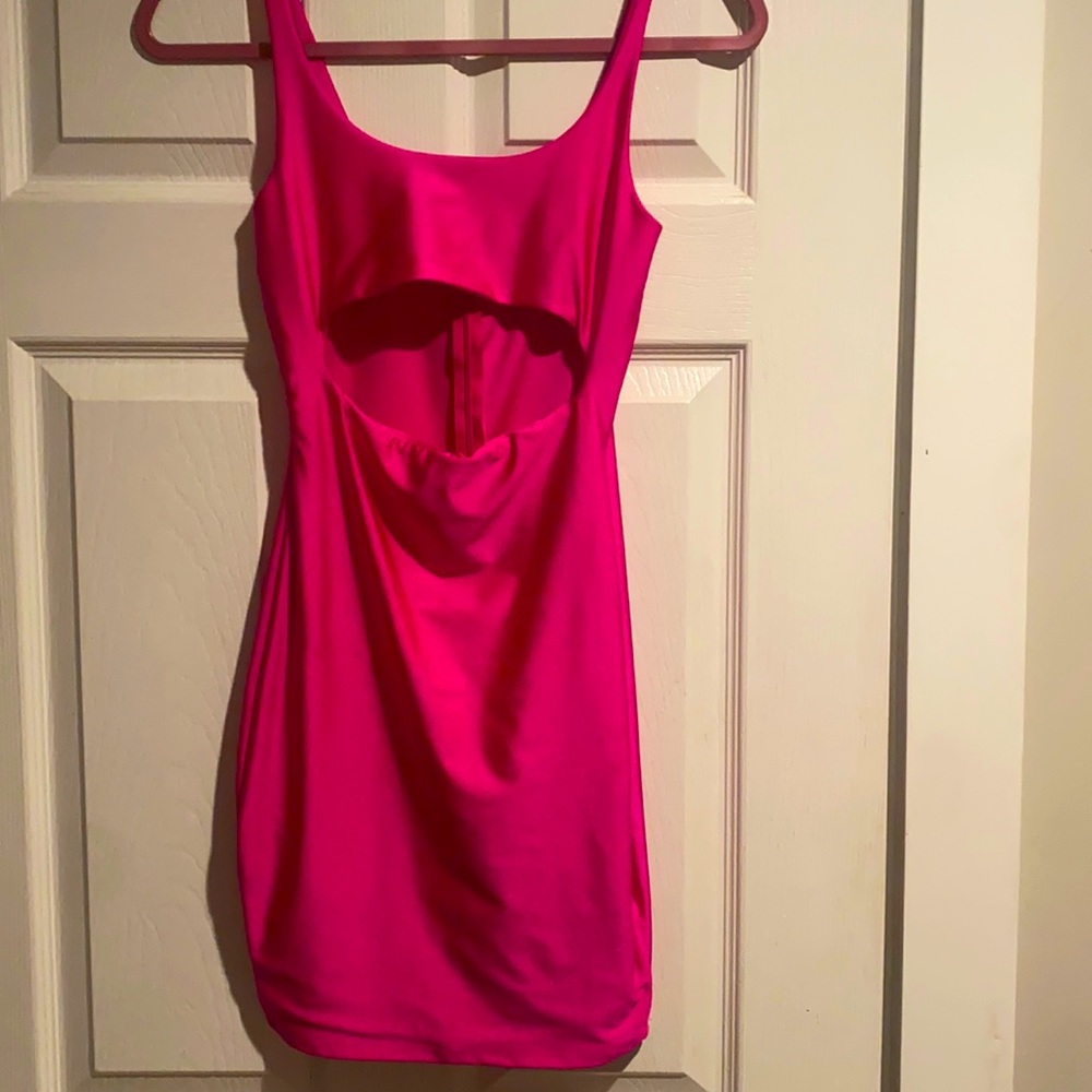 Size xs/small body con hot pink stretchy mini dress with cut out. Zip up back